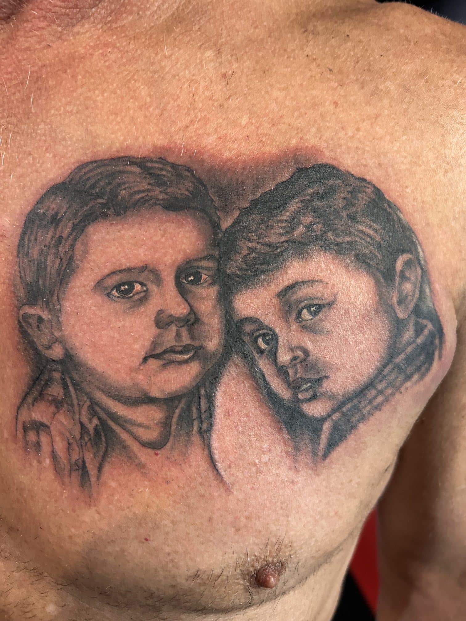Black and grey realism portrait tattoo by George at Mayhem Ink Tattoo